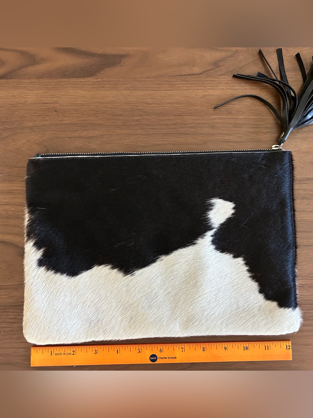 Black and White Cowhide Zip Clutch with Tassel